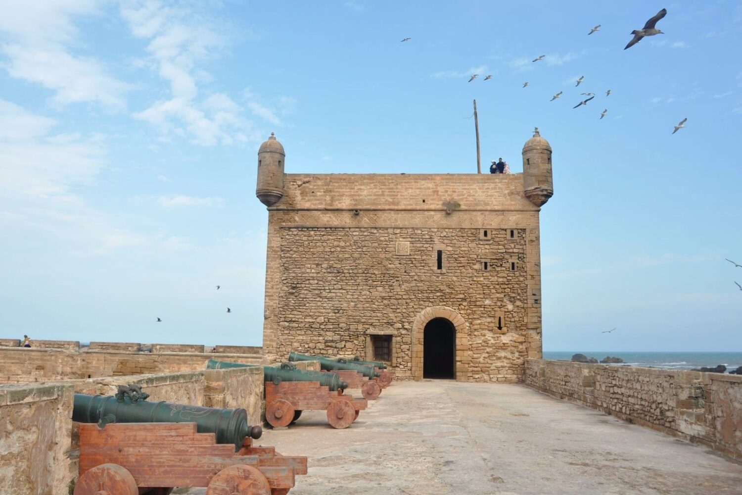 Essaouira port, blue fishing boats and Skala ramparts, Morocco