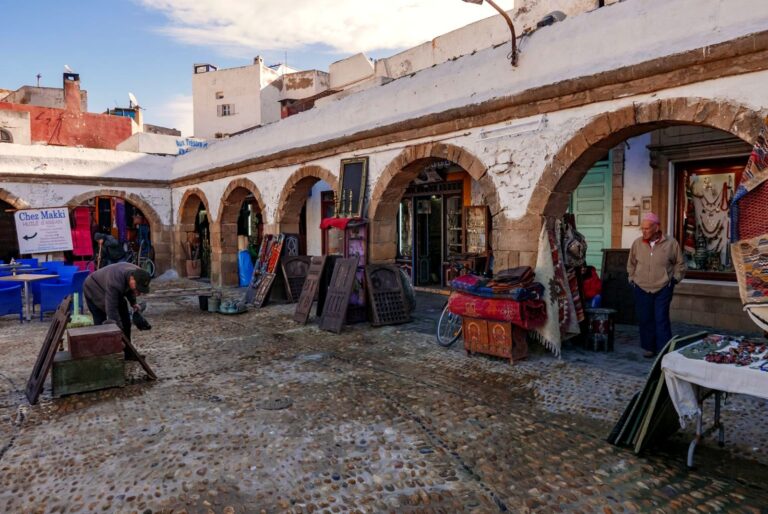 Essaouira port, blue fishing boats and Skala ramparts, Morocco