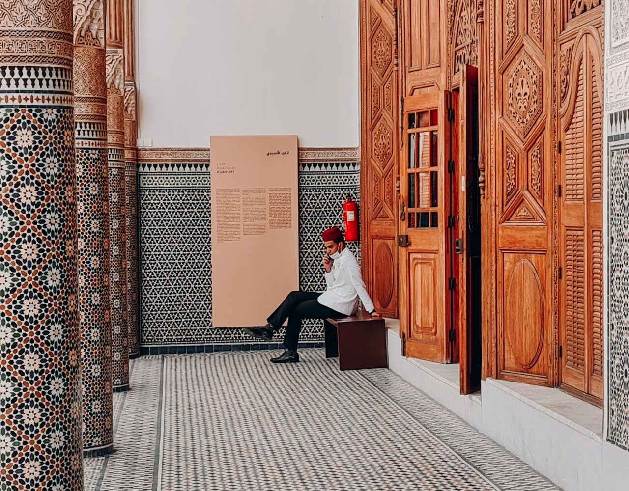 Carved cedar and zellige in a historic madrasa, Fes