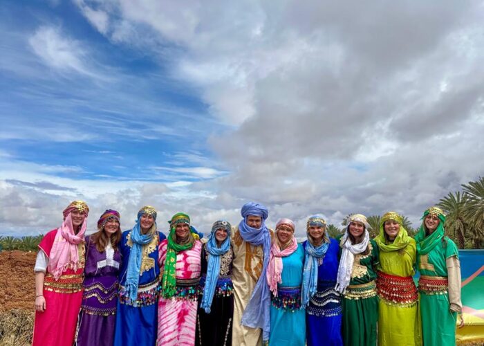 University group above a palm oasis in southern Morocco