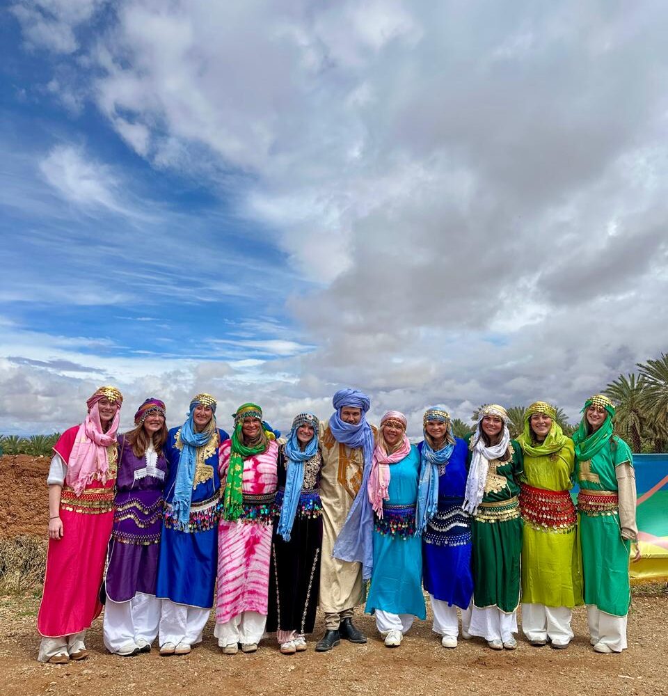 University group above a palm oasis in southern Morocco